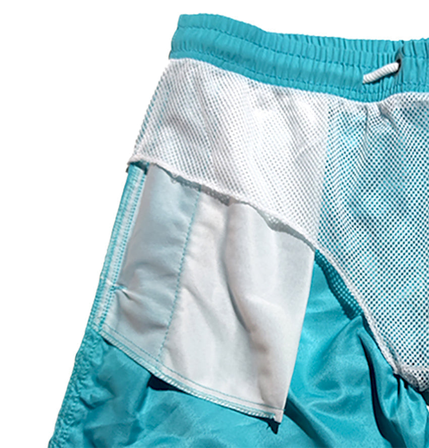 "Men's quick-dry swim trunks with trendy design, elastic waistband, colorful patterns, ideal for beach or pool activities."