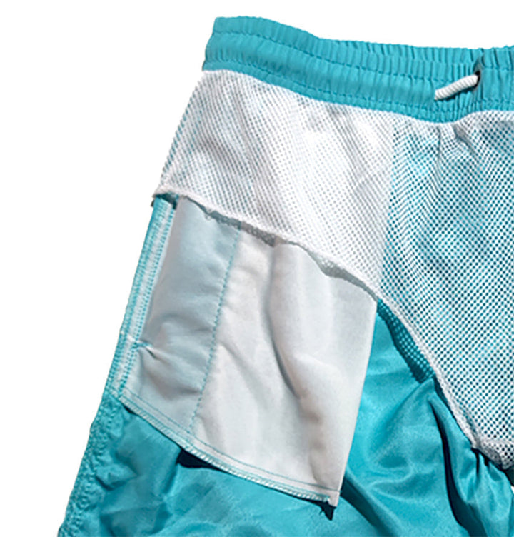 "Men's quick-dry swim trunks with trendy design, elastic waistband, colorful patterns, ideal for beach or pool activities."