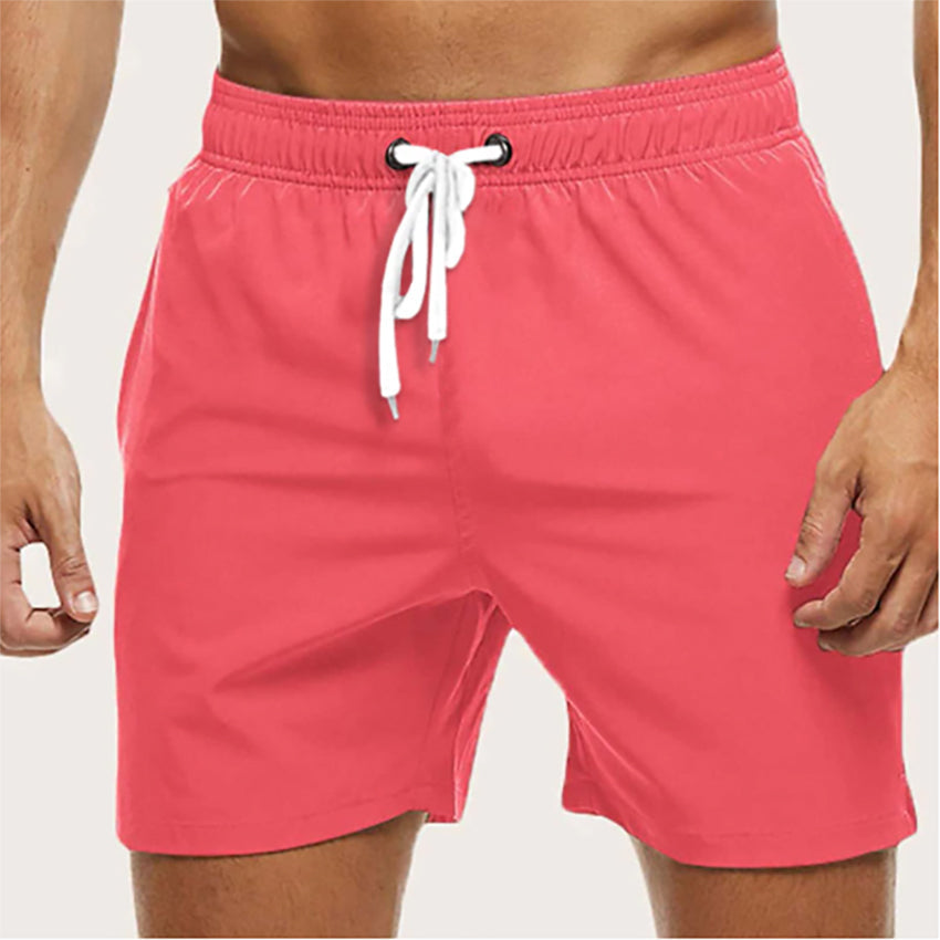 "Men's quick-dry swim trunks with trendy design, elastic waistband, colorful patterns, ideal for beach or pool activities."