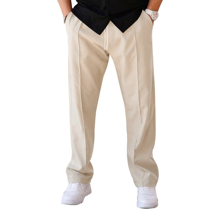 "Men's relaxed linen trousers, wide-leg, breathable, versatile colors like beige, black, blue; perfect comfort and style"