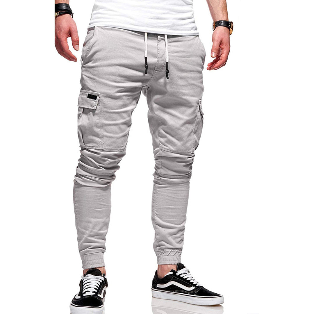 "Men's slim-fit cargo joggers with pockets, breathable cotton, elastic waistband, versatile and stylish for active lifestyles