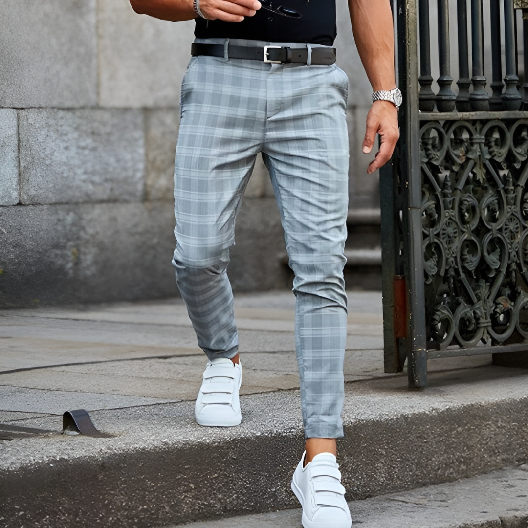 "Men's slim fit checked trousers in various colors, showcasing a tailored design, ideal for formal or casual occasions."