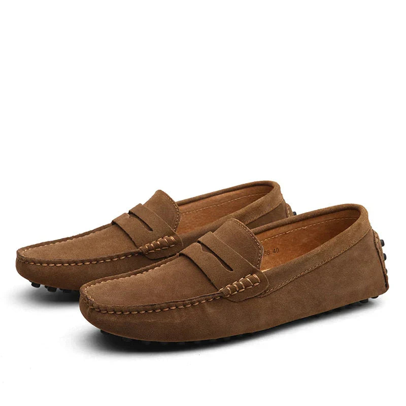 "Men's suede driving loafers with flexible sole, showcasing elegant design and non-slip rubber grip."