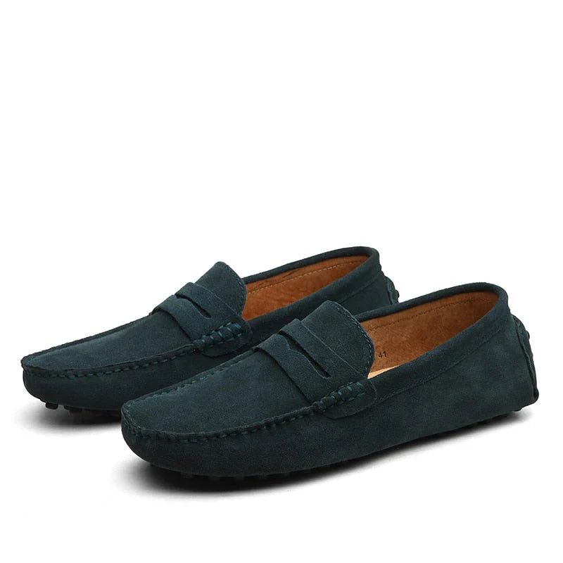 "Men's suede driving loafers with flexible sole, showcasing elegant design and non-slip rubber grip."