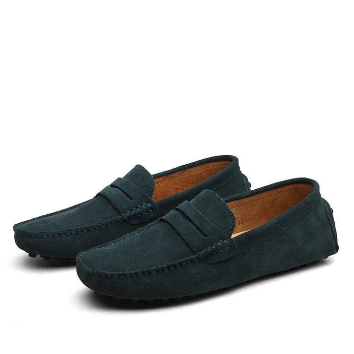 "Men's suede driving loafers with flexible sole, showcasing elegant design and non-slip rubber grip."