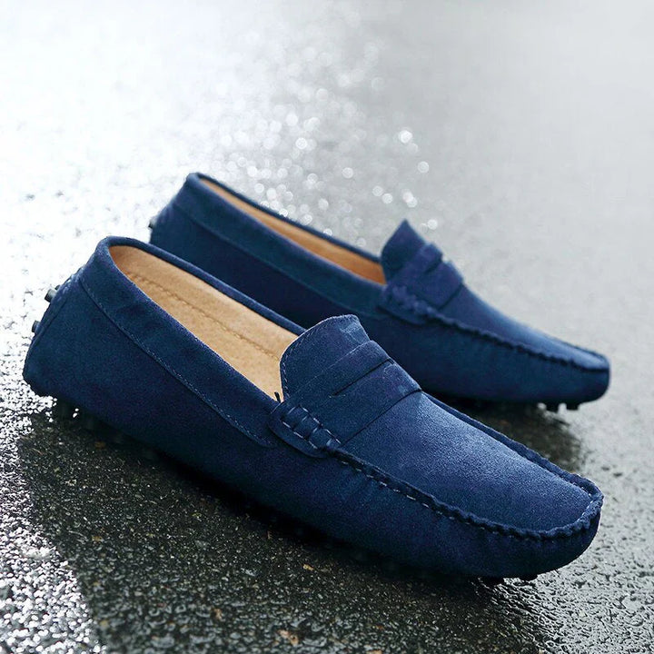 "Men's suede driving loafers with flexible sole, showcasing elegant design and non-slip rubber grip."