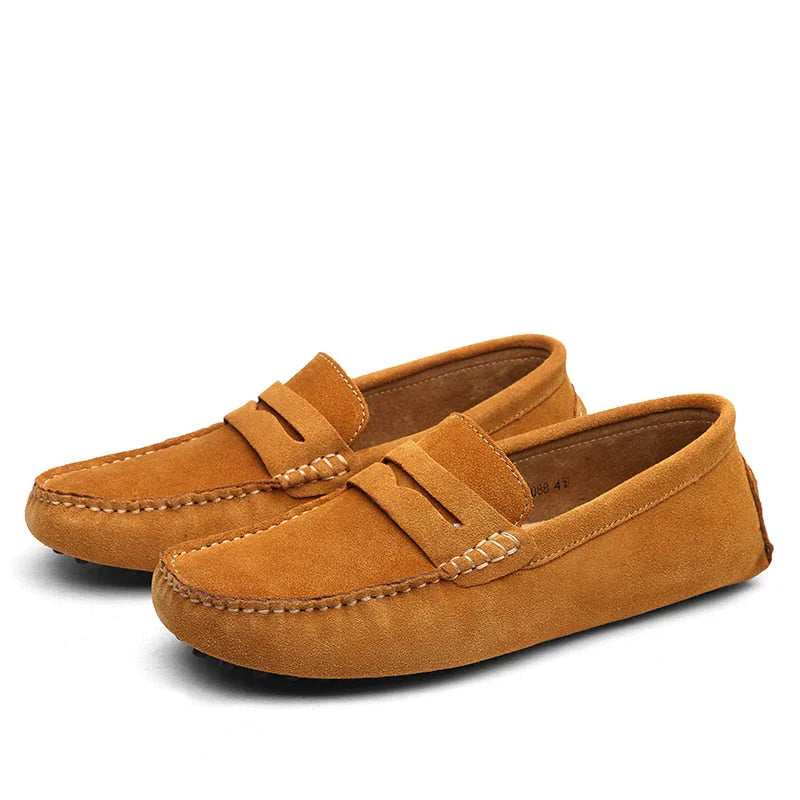"Men's suede driving loafers with flexible sole, showcasing elegant design and non-slip rubber grip."