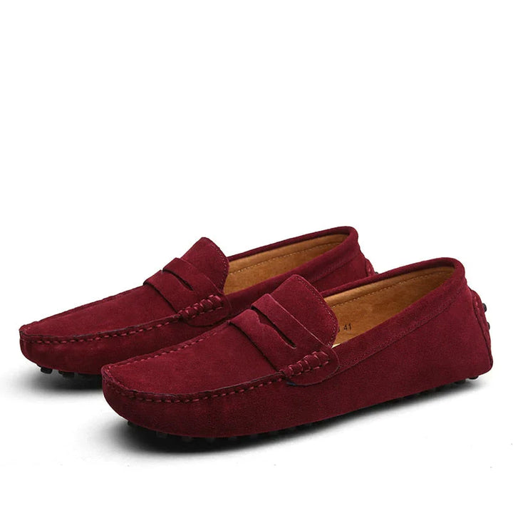 "Men's suede driving loafers with flexible sole, showcasing elegant design and non-slip rubber grip."