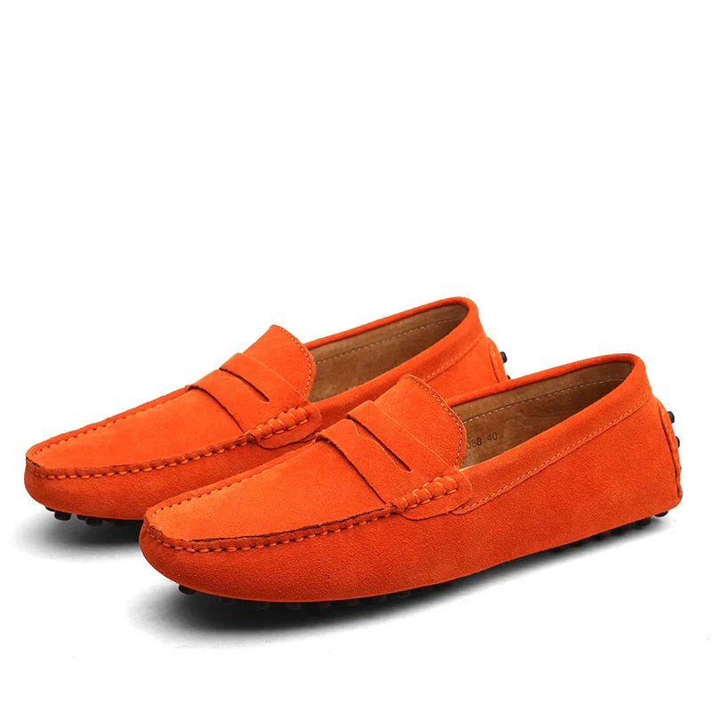"Men's suede driving loafers with flexible sole, showcasing elegant design and non-slip rubber grip."