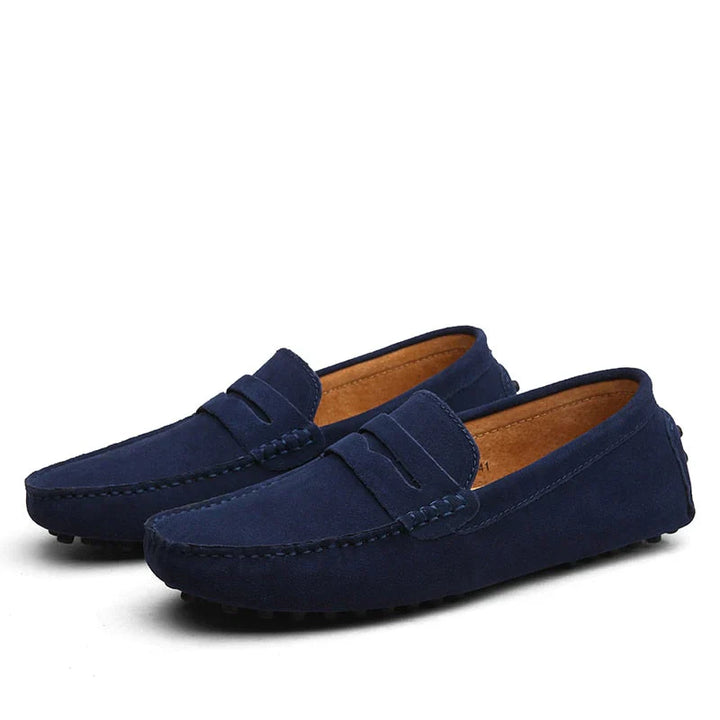 "Men's suede driving loafers with flexible sole, showcasing elegant design and non-slip rubber grip."