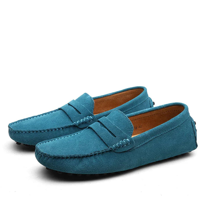 "Men's suede driving loafers with flexible sole, showcasing elegant design and non-slip rubber grip."