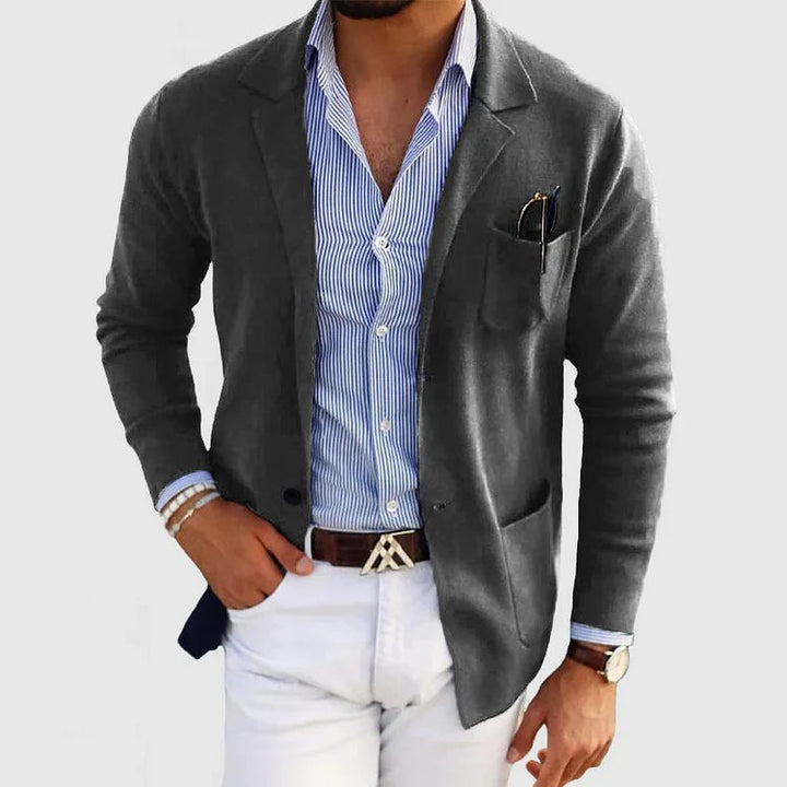 "Men's tailored blazer with casual flap pockets, sharp silhouette, and versatile fit for modern style and comfort."