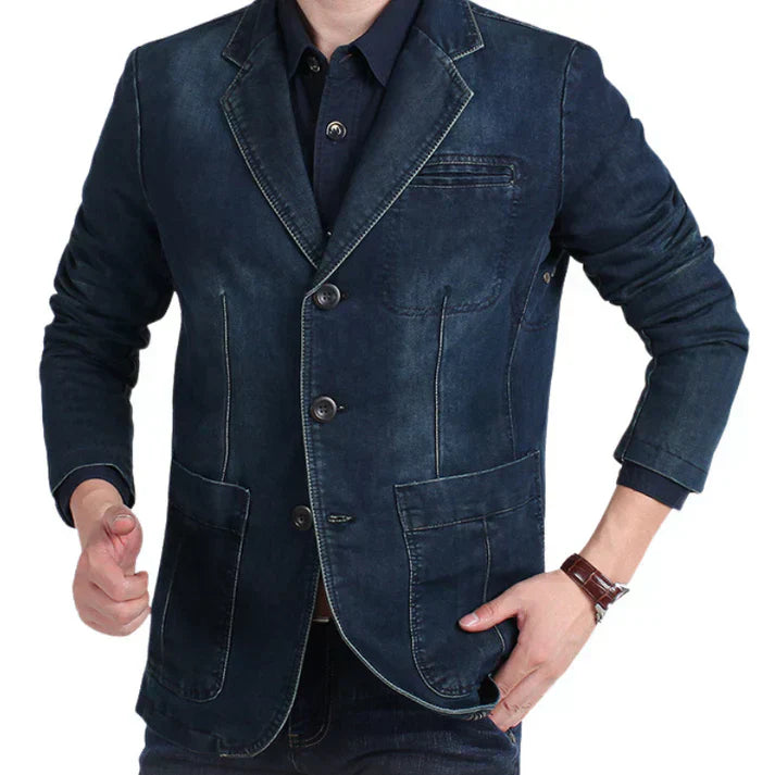 "Men's tailored denim blazer with refined structure, casual sophistication, versatile style, and comfortable fit."