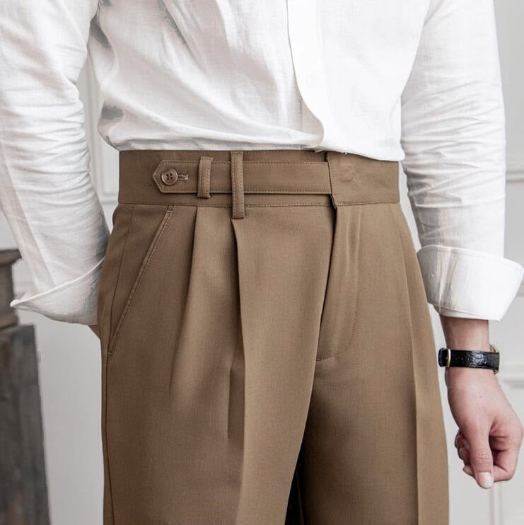 Men’s tailored essential trousers in classic colors, streamlined fit, perfect for formal or casual wear, showcasing elegance.