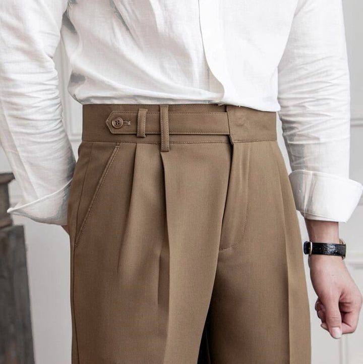 Men’s tailored essential trousers in classic colors, streamlined fit, perfect for formal or casual wear, showcasing elegance.
