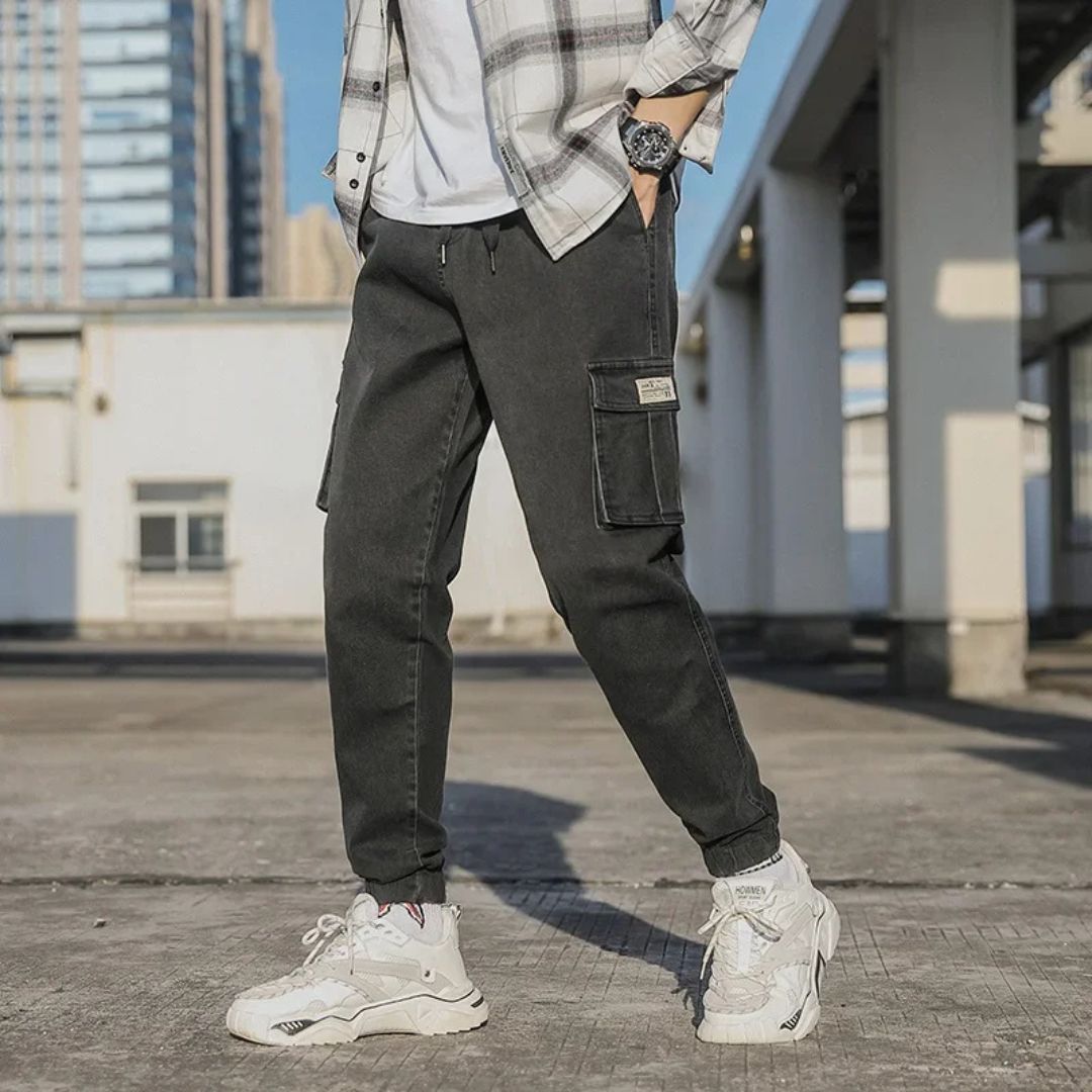 Men's Utility Denim Joggers with Pockets, soft denim, elastic waistband, multiple pockets, versatile casual streetwear pants.