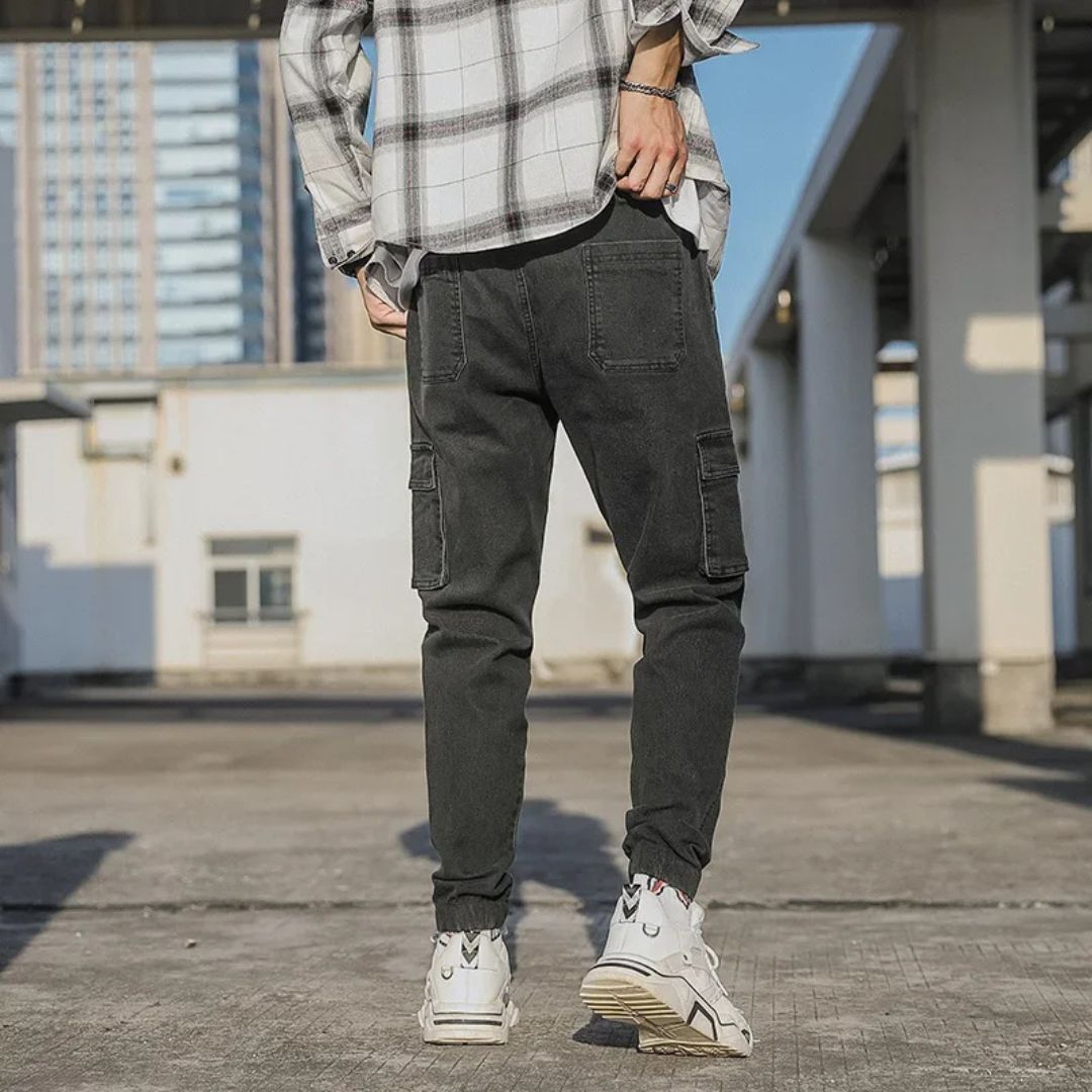 Men's Utility Denim Joggers with Pockets, soft denim, elastic waistband, multiple pockets, versatile casual streetwear pants.