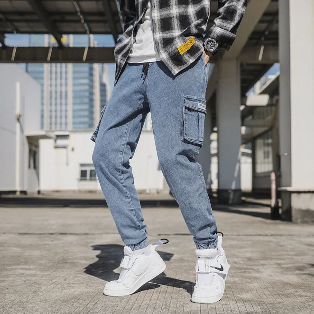 Men's Utility Denim Joggers with Pockets, soft denim, elastic waistband, multiple pockets, versatile casual streetwear pants.