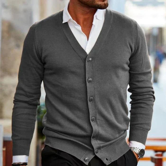 Men's versatile cardigan in soft gray, showcasing a classic design and relaxed fit for casual comfort and style adaptability.