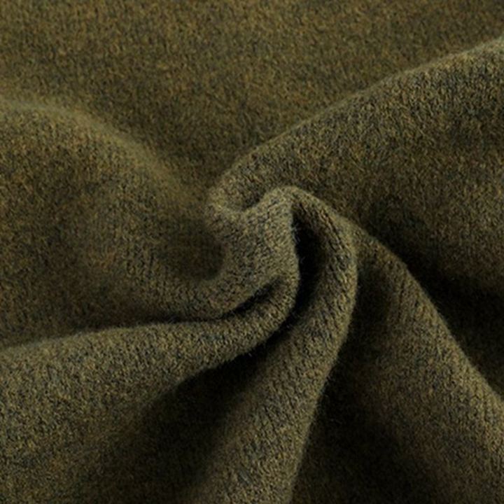 Men's wool button-up cardigan in green, showcasing premium wool fabric, button-up front, and relaxed fit for versatile stylin