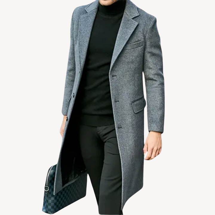 Men's wool overcoat, elegant long coat. Front view shows sleek fit, secure button closure, versatile color for cold weather.