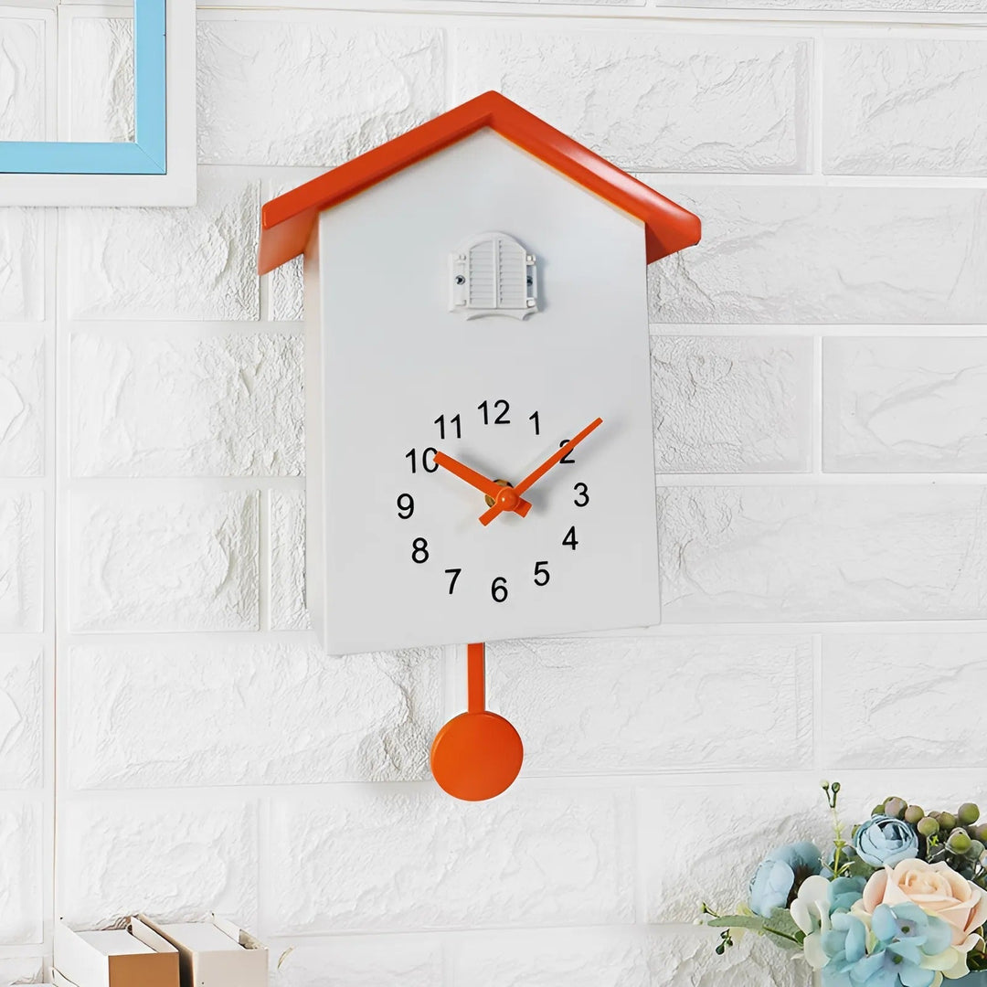"Minimalist cuckoo wall clock with sleek black and white finish, modern design, whimsical bird element, compact 20x25cm size.