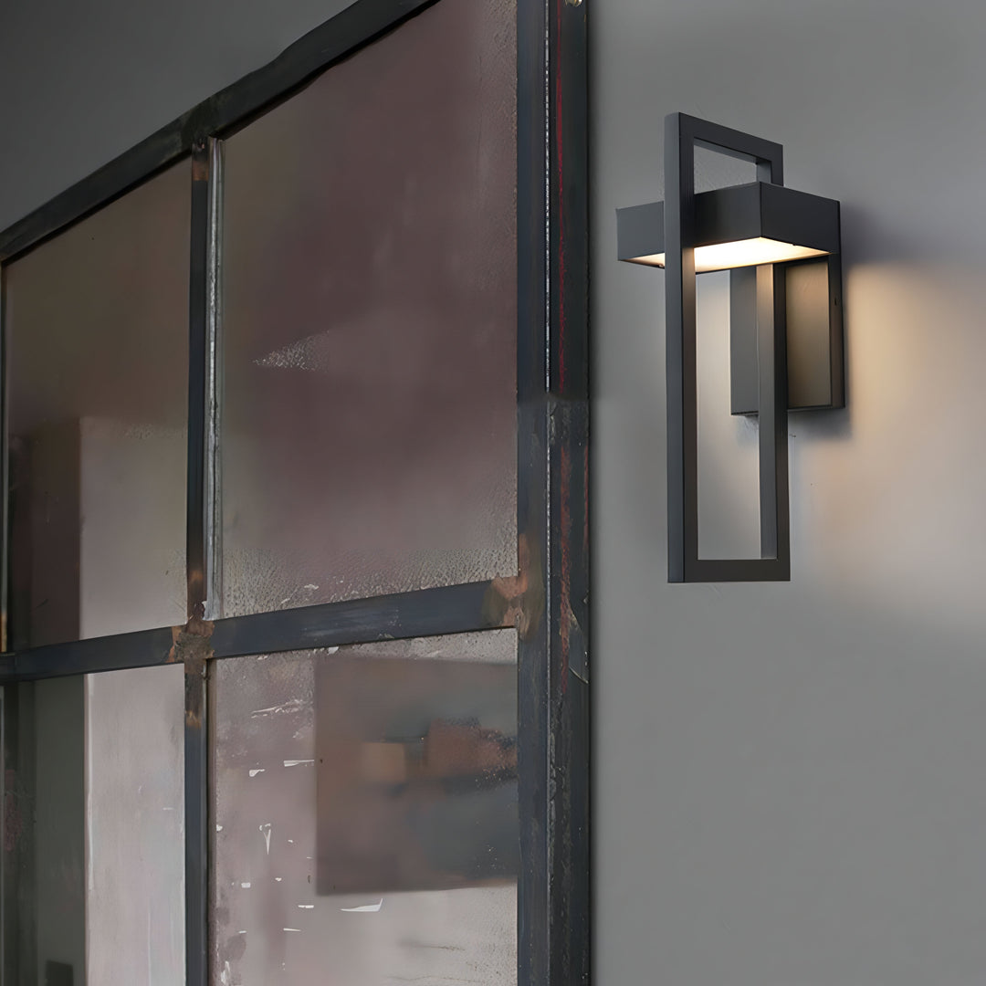 Modern black outdoor wall light with stainless steel finish, sleek design, perfect for enhancing exterior ambiance.