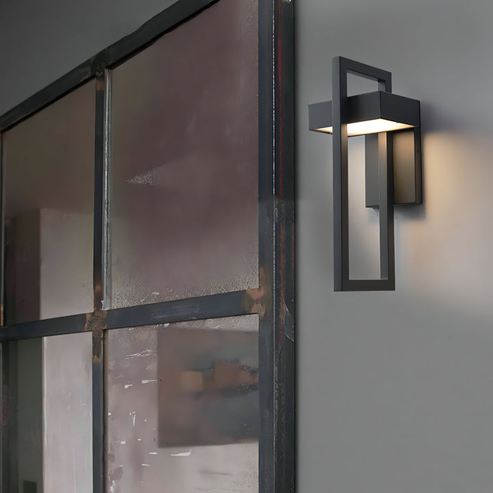 Modern black outdoor wall light with stainless steel finish, sleek design, perfect for enhancing exterior ambiance.