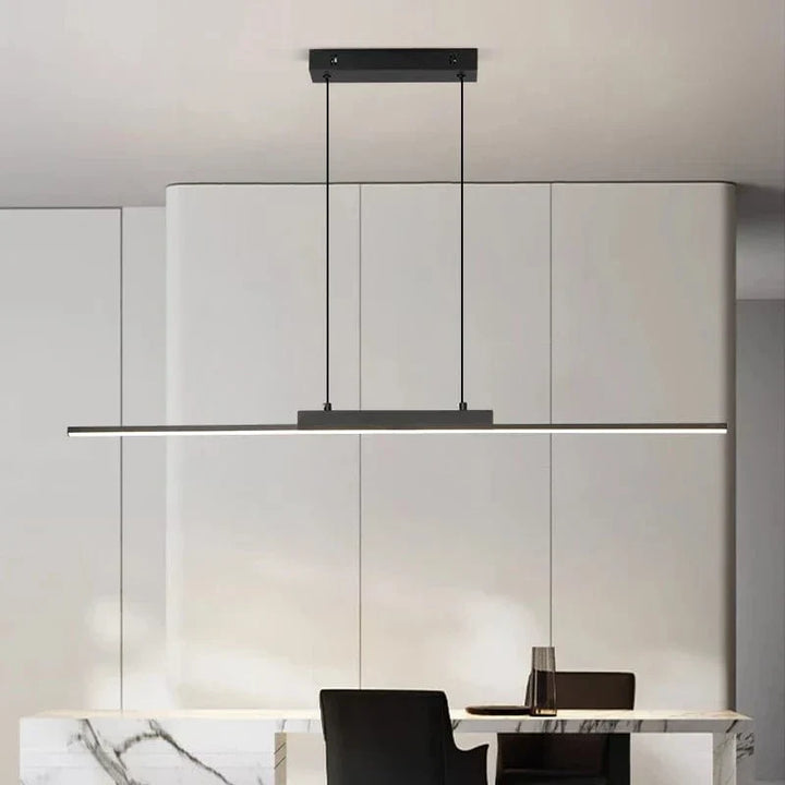 "Modern black pendant light with tubular silhouette, minimalist aluminium fixture, perfect for dining rooms and kitchens."