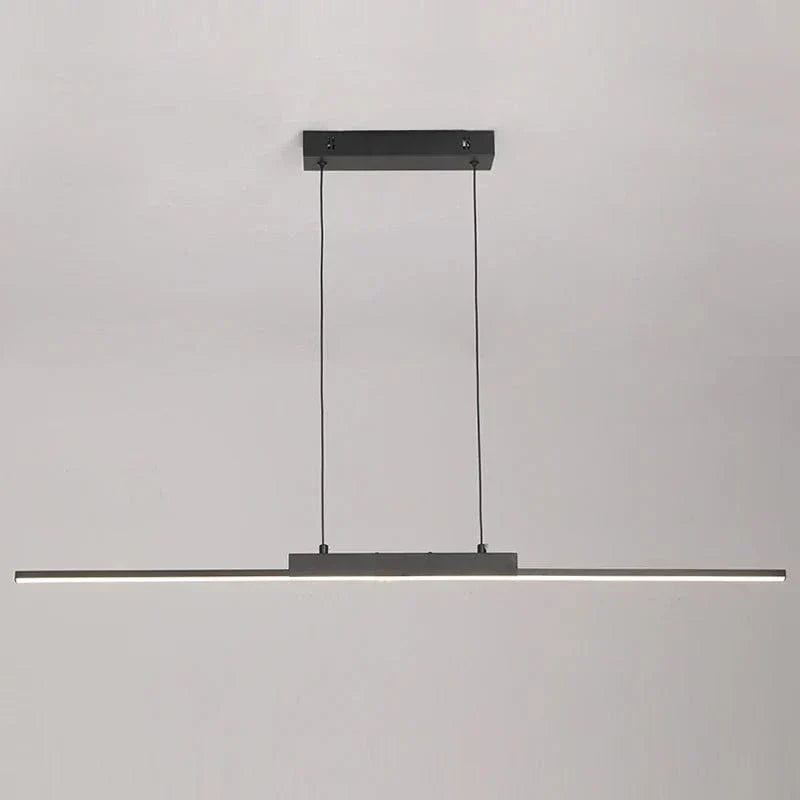 "Modern black pendant light with tubular silhouette, minimalist aluminium fixture, perfect for dining rooms and kitchens."