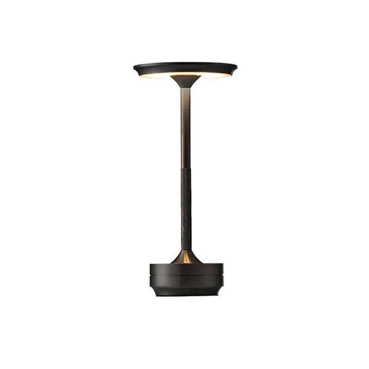 Modern cordless table lamp with touch control, Nordic design, gold frame, brushed finish, illuminating a stylish room.