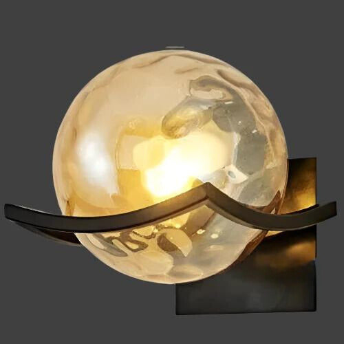 "Modern LED wall lamp with sleek glass finish, ideal for contemporary home decor and energy-efficient lighting."