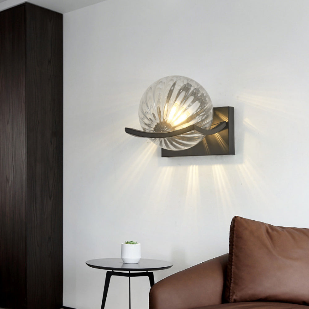 "Modern LED wall lamp with sleek glass finish, ideal for contemporary home decor and energy-efficient lighting."