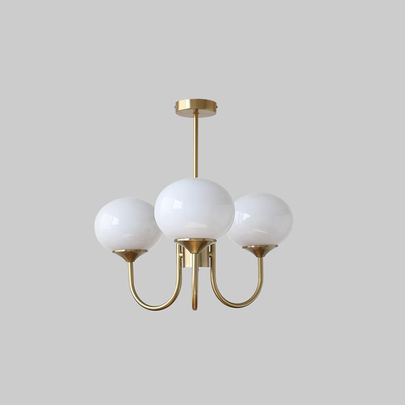 Modern pink and gold chandelier with elegant glass shades, ideal ceiling light fixture for chic home decor and illumination.