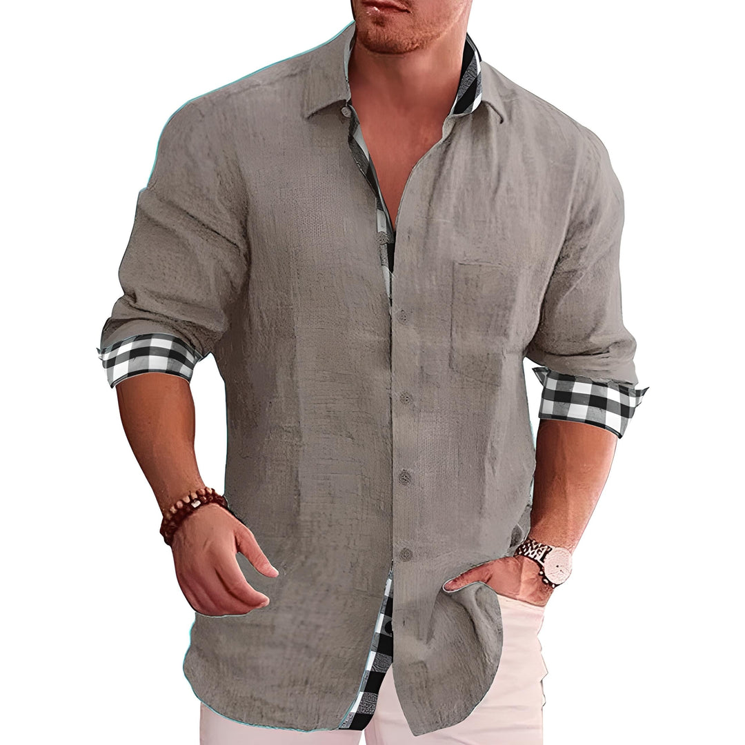 Modern stylish men's shirt with sleek design, versatile for work or social events; a refined look for all seasons.