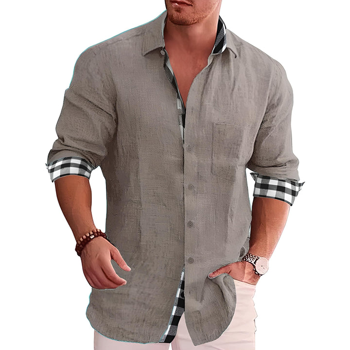 Modern stylish men's shirt with sleek design, versatile for work or social events; a refined look for all seasons.