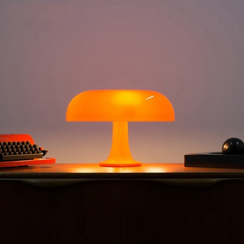"Mushroom-shaped minimalist table lamp with LED, Nordic design, in white and orange; perfect for modern interiors."