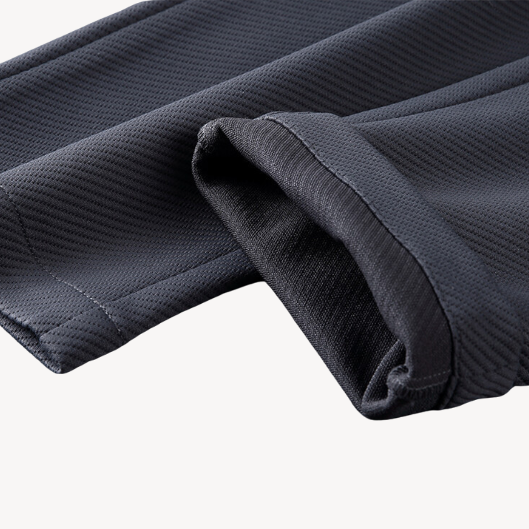 "Navy and black men's tracksuit set with zip jacket and joggers, showcasing sleek design and comfort for casual or gym wear."