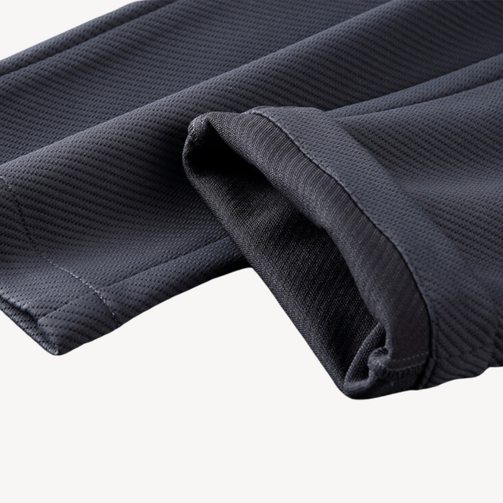 "Navy and black men's tracksuit set with zip jacket and joggers, showcasing sleek design and comfort for casual or gym wear."