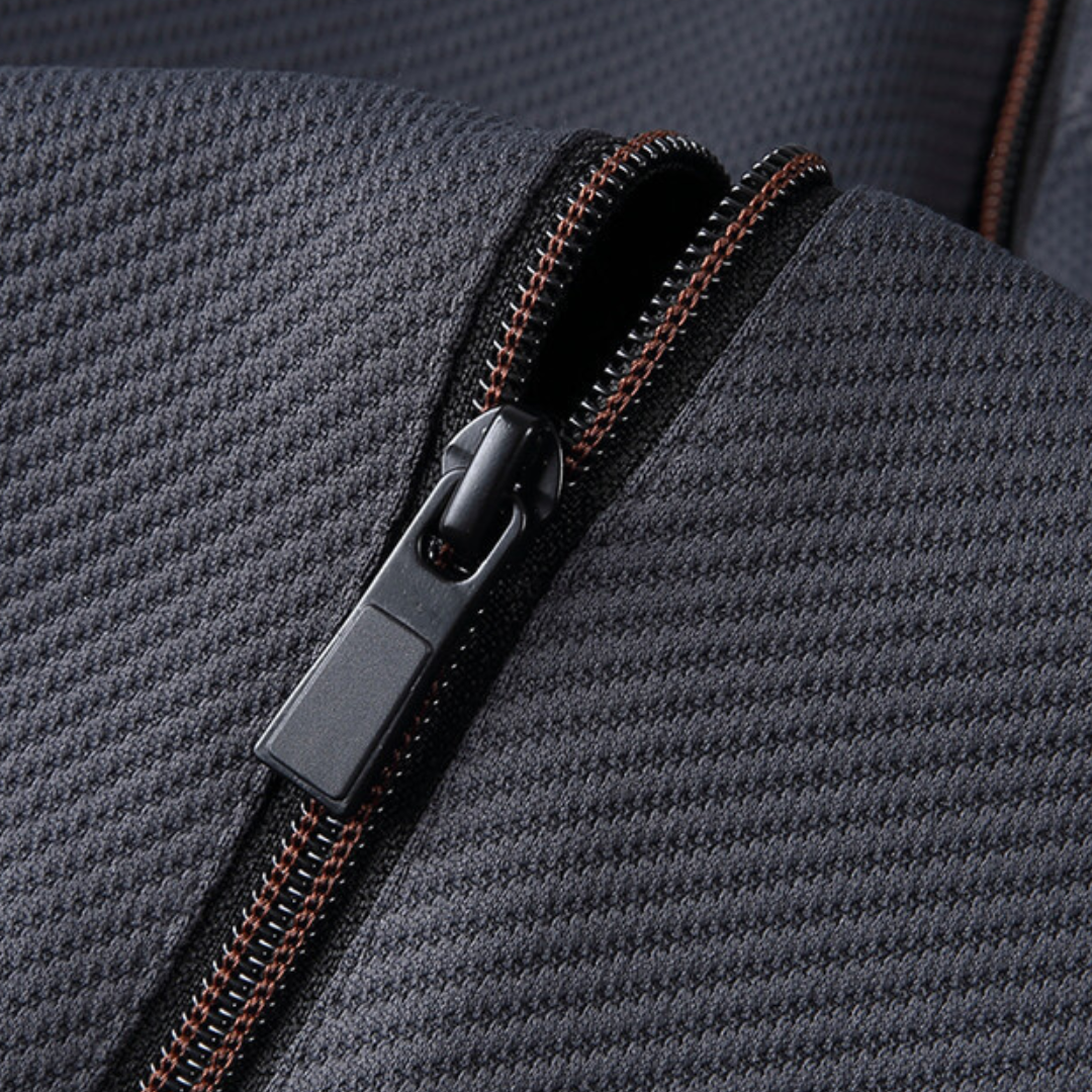 "Navy and black men's tracksuit set with zip jacket and joggers, showcasing sleek design and comfort for casual or gym wear."