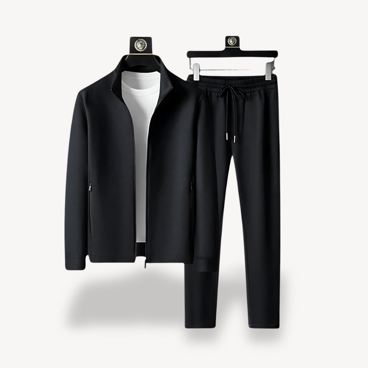 "Navy and black men's tracksuit set with zip jacket and joggers, showcasing sleek design and comfort for casual or gym wear."