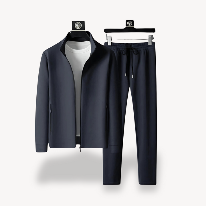 "Navy and black men's tracksuit set with zip jacket and joggers, showcasing sleek design and comfort for casual or gym wear."