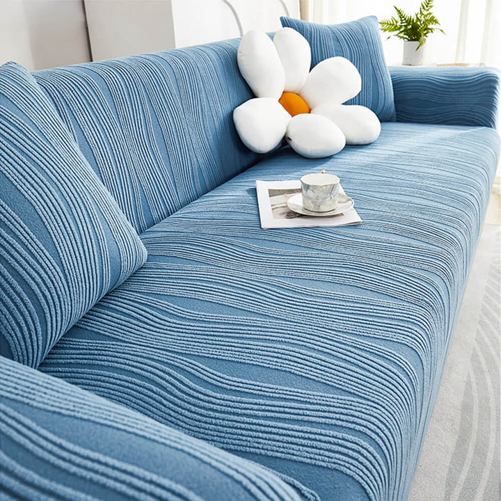 Pet-friendly jacquard stretch sofa cover in stylish design, protects against scratches and complements any decor.