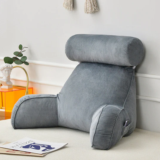"Plush backrest pillow with arms, adjustable headrest, soft velour cover, ergonomic design for neck and back support."