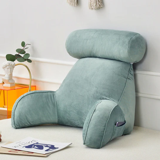 "Plush backrest pillow with arms, adjustable headrest, soft velour cover, ergonomic design for neck and back support."