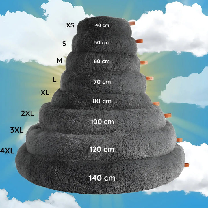 "Plush luxury dog bed for anxiety relief in apricot color, round with raised rim, available in multiple sizes."