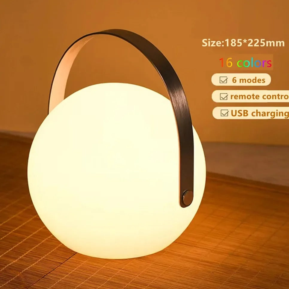 Portable waterproof cordless lamp with remote control, sleek modern design, suitable for indoor and outdoor lighting.