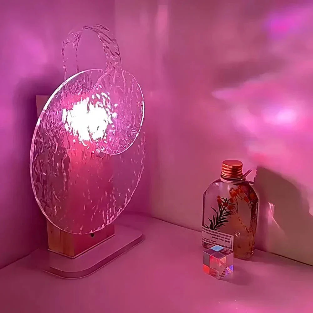 "Rechargeable LED lamp projects sunset hues, ocean waves; adds cozy ambiance to home decor with adjustable head."