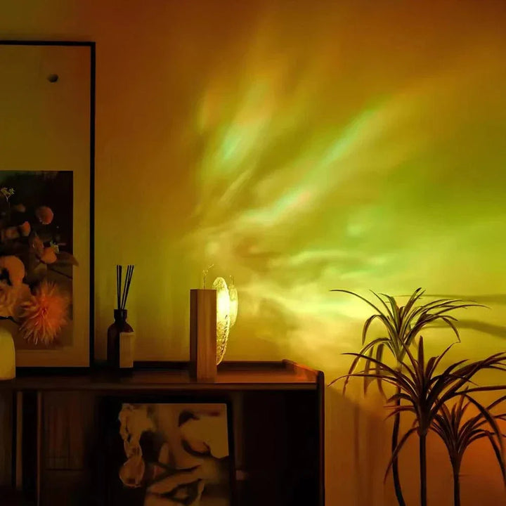 "Rechargeable LED lamp projects sunset hues, ocean waves; adds cozy ambiance to home decor with adjustable head."