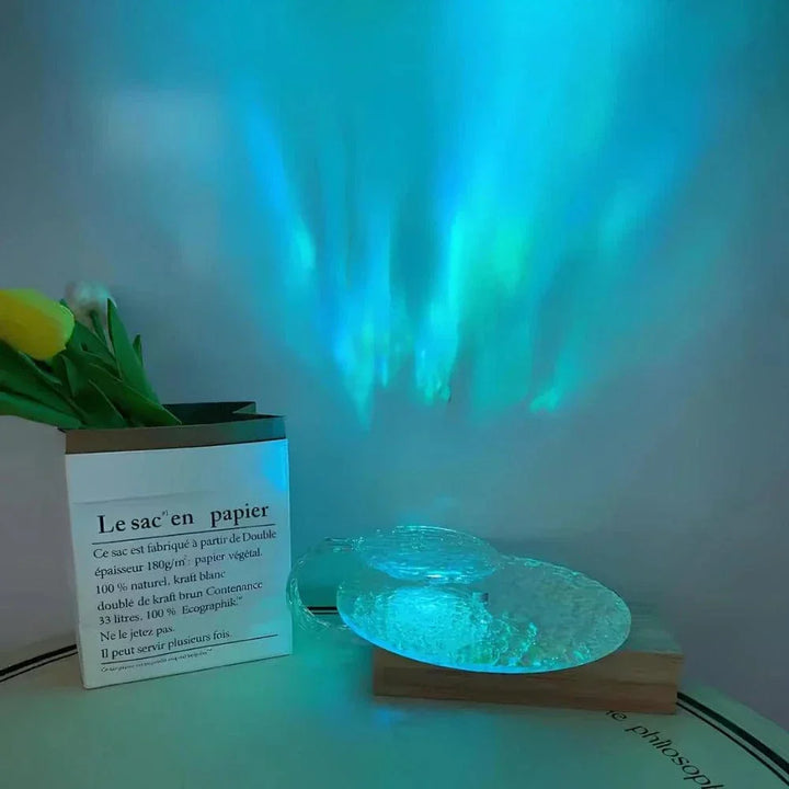 "Rechargeable LED lamp projects sunset hues, ocean waves; adds cozy ambiance to home decor with adjustable head."